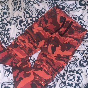 Orange and black camouflage joggers